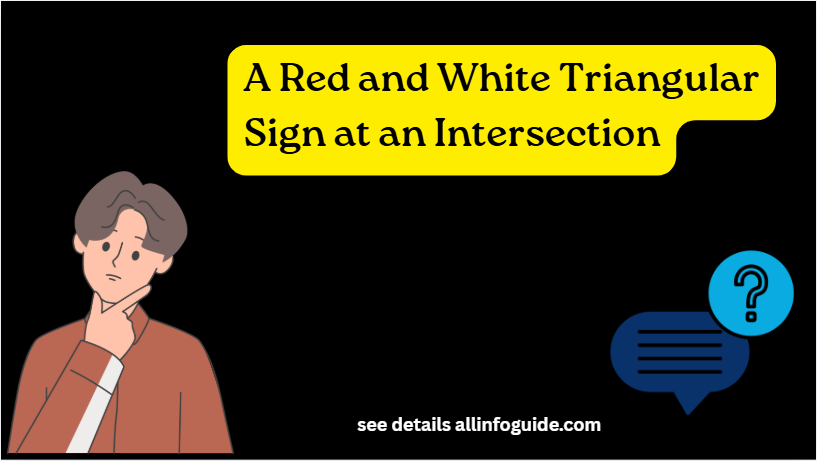 A Red and White Triangular Sign at an Intersection